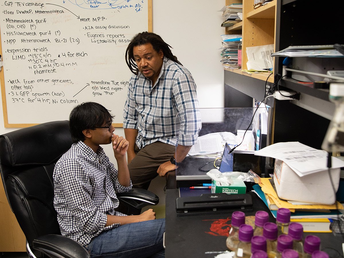 A Caltech career adviser speaks with a student